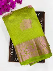 Attractive Green Colored Silk Cotton Saree With Floral Design For Women